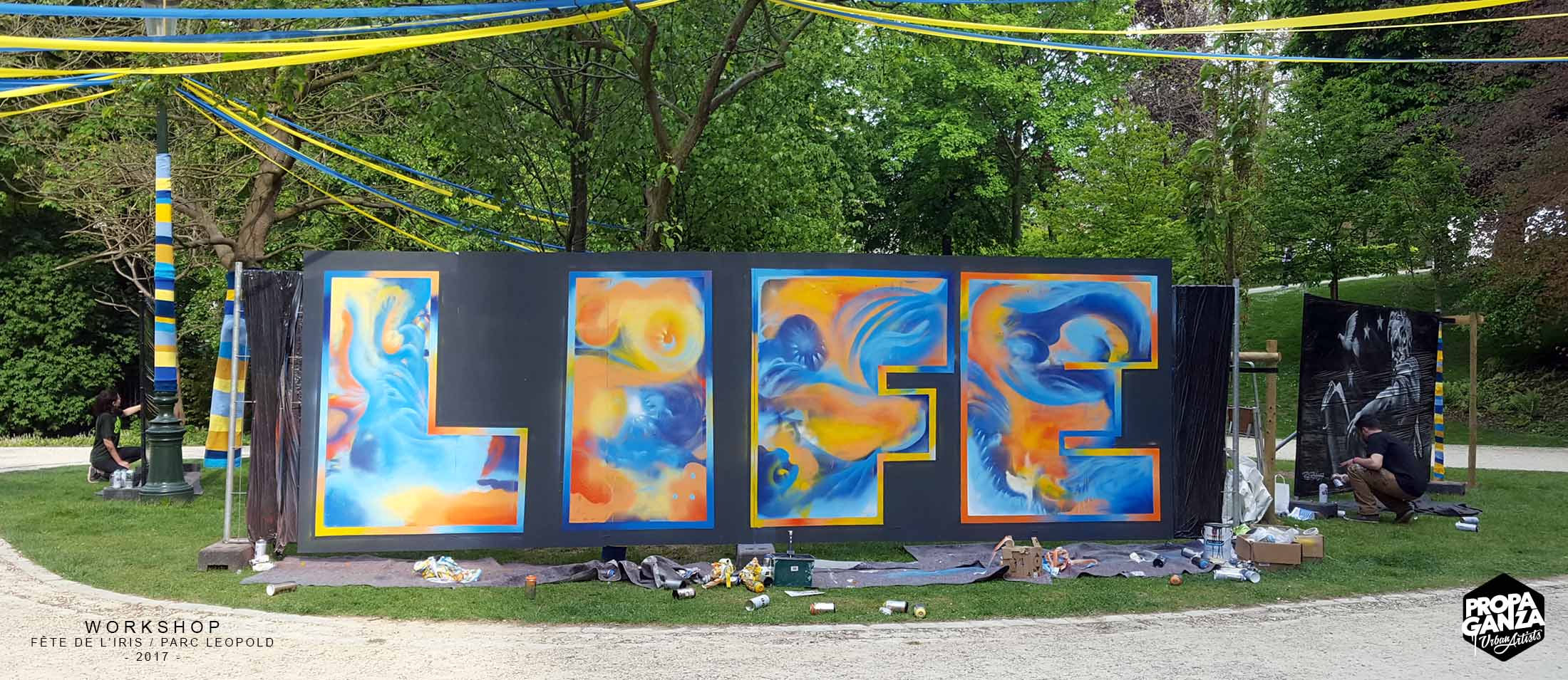 https://www.propaganza.be/wp-content/uploads/2019/04/Propaganza-graffiti-workshop-iris-leopold-parc-bruxelles-brussels-street-art-event-fresque-participative-2017.jpg